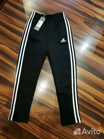 Новые зауженные утепленные штаны Adidas 128 р Новые зауженные утепленные штаны Adidas 128 р
