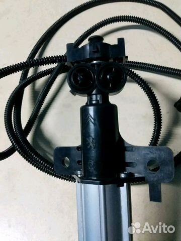 Фарсунка омывателя фары левая Peugeot 308