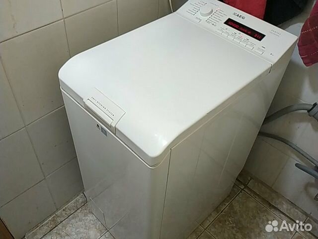 AEG с вертикальной загрузкой 6 кг 1200 об