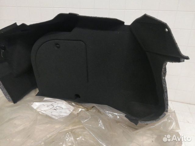 Обивка багажника задняя левая Opel Astra H седан