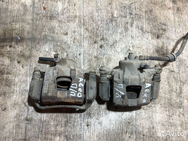 Суппорт тормозной передний левый Chevrolet Aveo Т