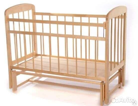 Детская кроватка с маятником