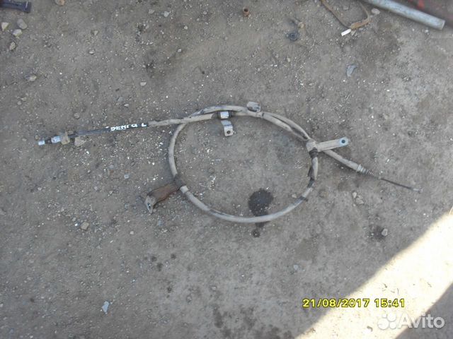 Трос стояночного тормоза (ручника) левый Киа Венга