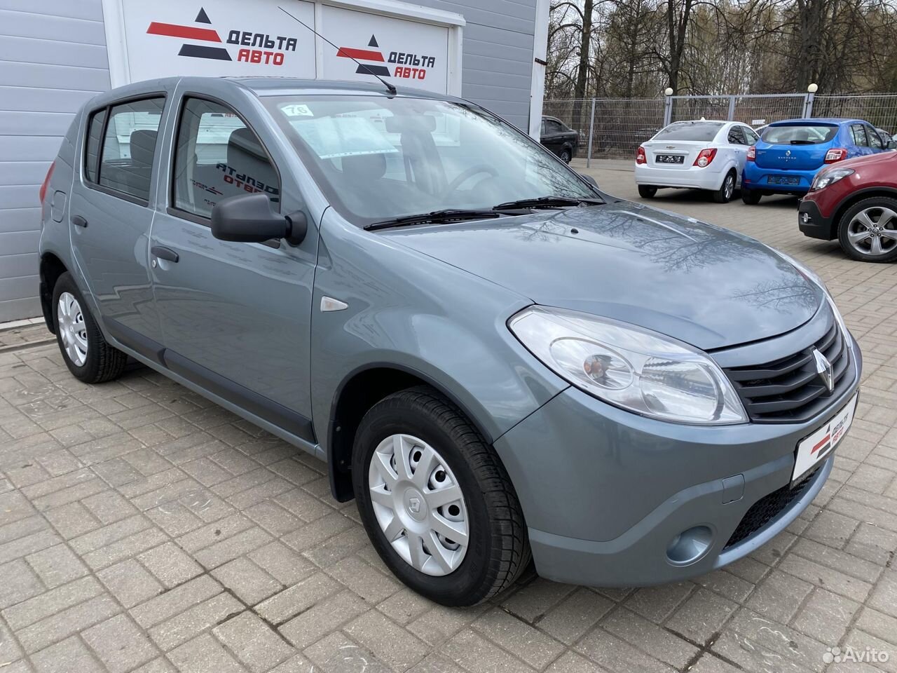 Рено сандеро 2011, красный. Сандеро 2012 года. Рено сандеро 2012 артикулы. Renault sandero i 2012. Рено sandero 2011.