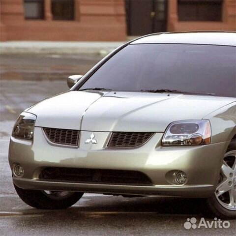 Передний бампер в цвет Mitsubishi Galant 9