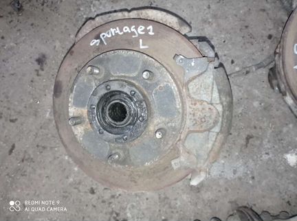 Суппорт левый Киа Спортейдж 1