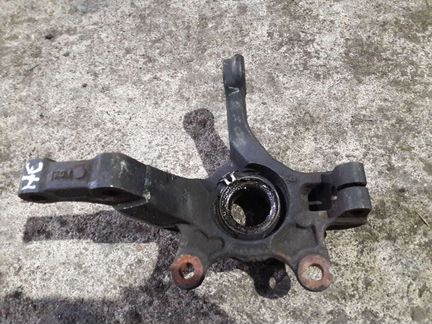 Кулак передний правый ниссан ноут