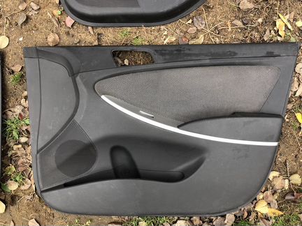 Обшивка двери Hyundai Solaris