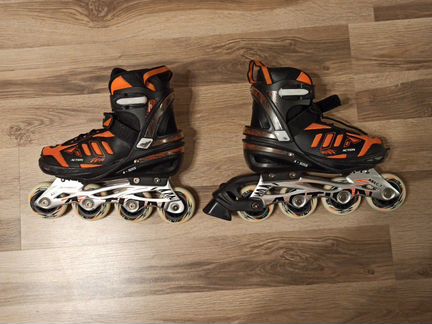 Роликовые коньки