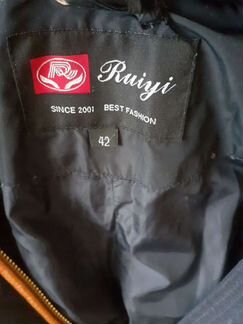 Пальто пуховое с натуральным мехом